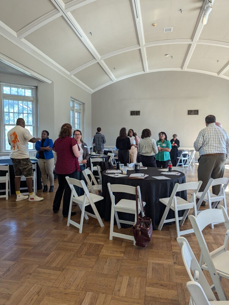Group doing an icebreaker activity at a strategic foresight workshop
